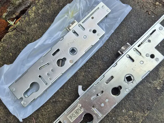 Removed multipoint door-lock centre cases and locking strip from MobileLS repair work in Leeds